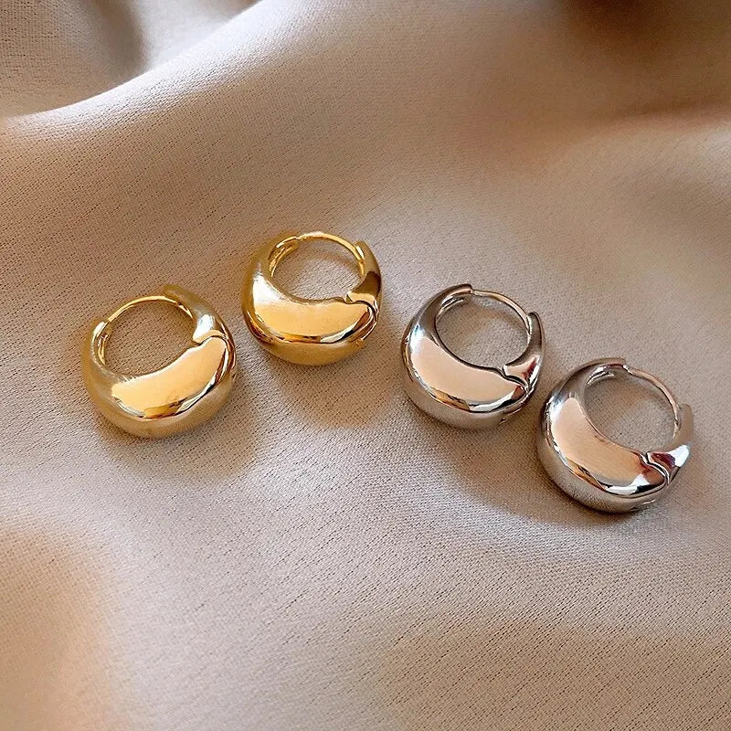“UrbanEdge – Punk Oval Hoop Earrings”