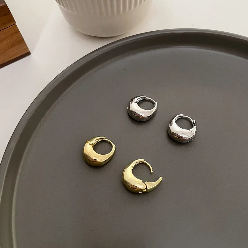 “UrbanEdge – Punk Oval Hoop Earrings”