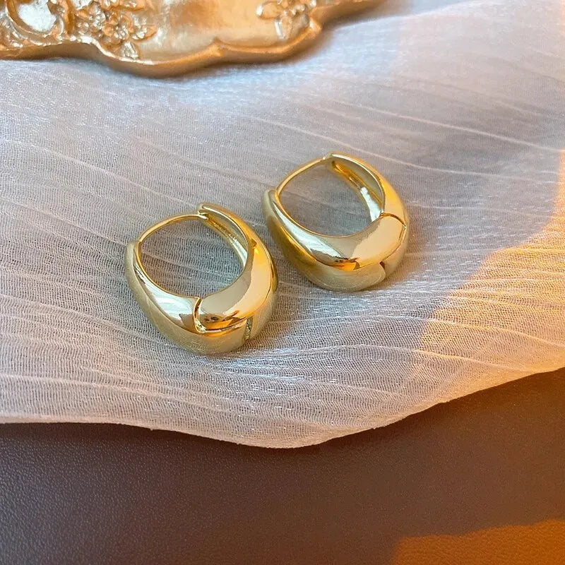 “UrbanEdge – Punk Oval Hoop Earrings”