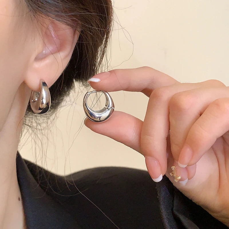 “UrbanEdge – Punk Oval Hoop Earrings”