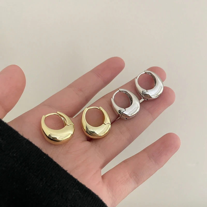 “UrbanEdge – Punk Oval Hoop Earrings”