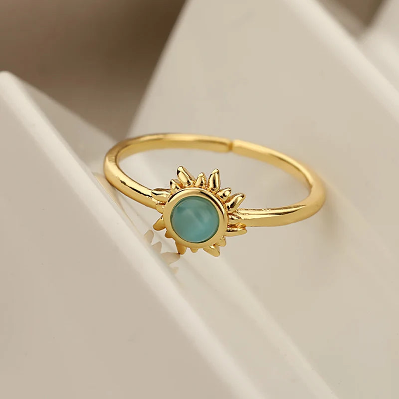 “SolarGlow – Opal Sun & Star Open Ring”