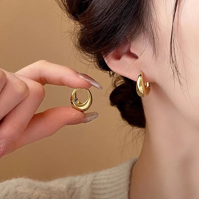 “UrbanEdge – Punk Oval Hoop Earrings”