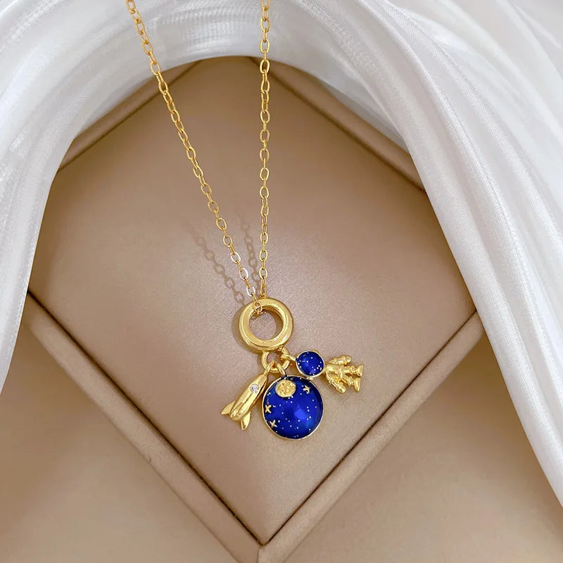 Cosmic Glow – Star & Planet Necklace