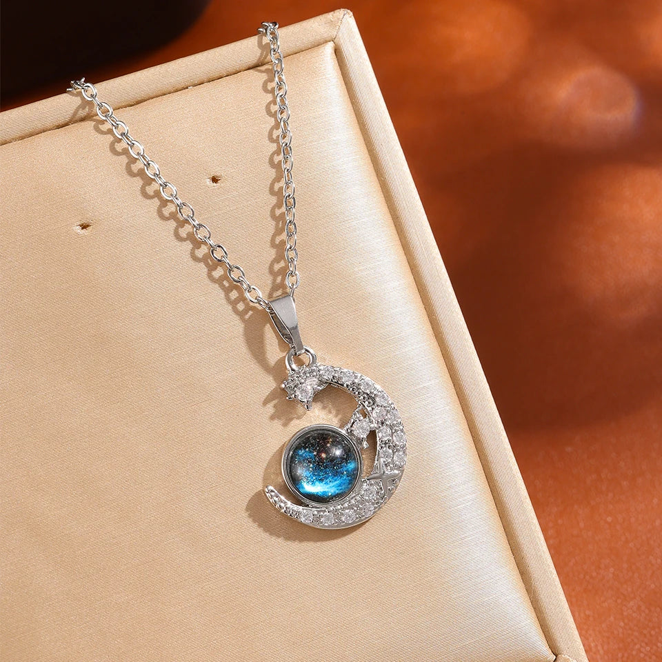 Cosmic Glow – Star & Planet Necklace