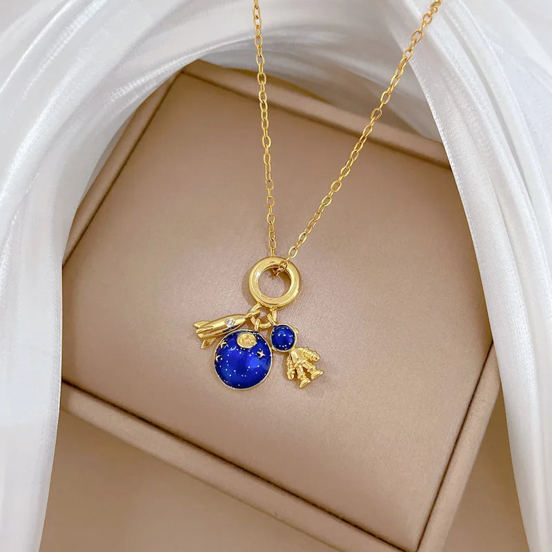 Cosmic Glow – Star & Planet Necklace
