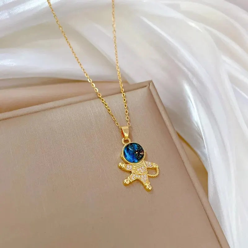 Cosmic Glow – Star & Planet Necklace