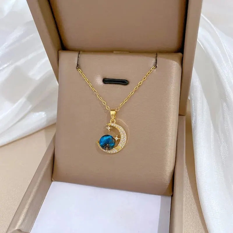 Cosmic Glow – Star & Planet Necklace