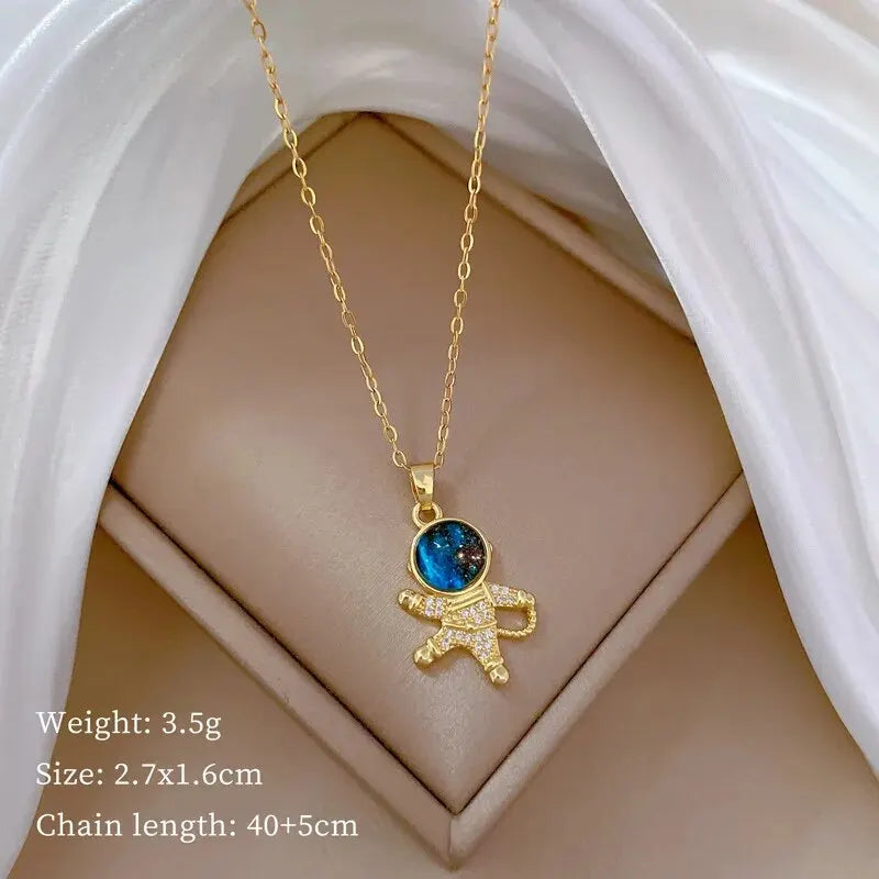 Cosmic Glow – Star & Planet Necklace